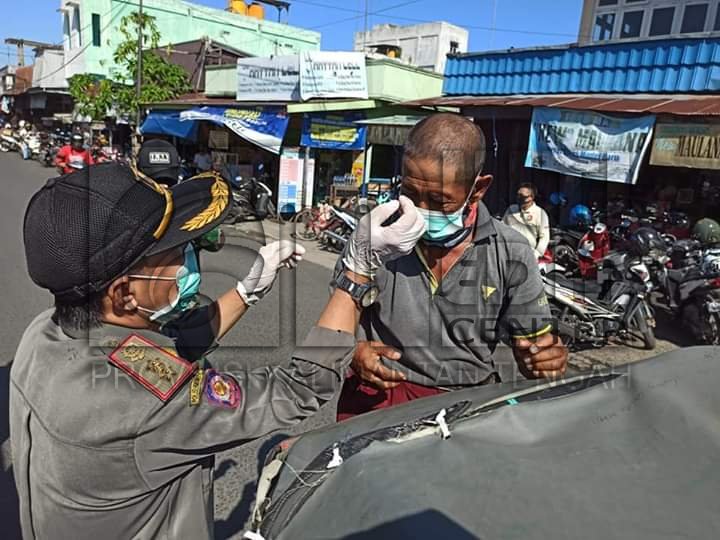 SatPol PP dan Damkar Kabupaten Kapuas Lakukan Razia Masker Demi Tingkatkan Kesadaran Masyarakat 