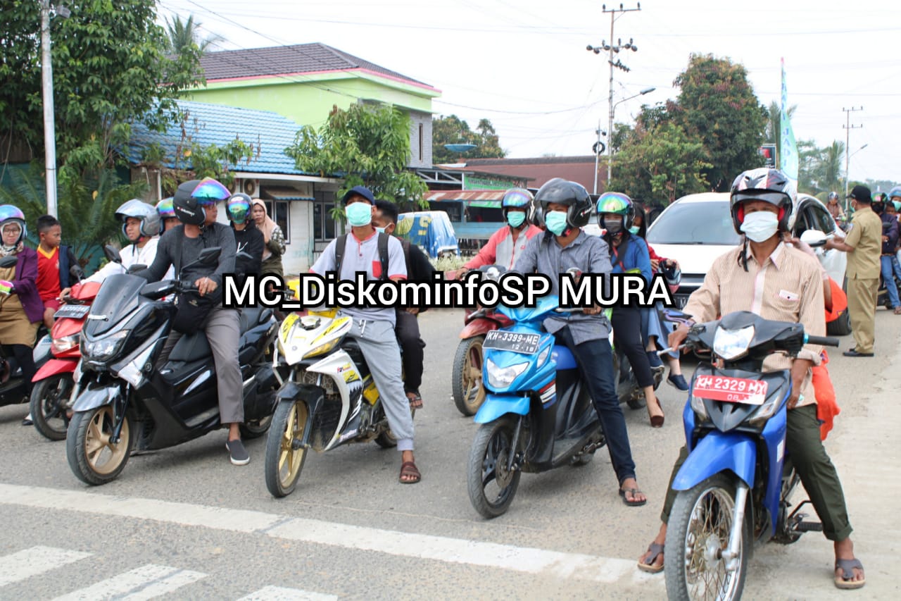 Dinas Kesehatan Murung Raya Bagikan Masker Gratis Untuk Pengguna Jalan