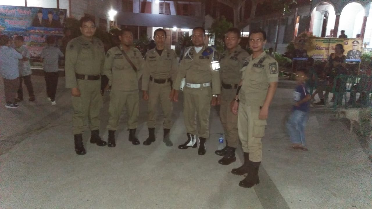 SatPol PP Dampingi Rombongan Bupati Kapuas Safari Natal