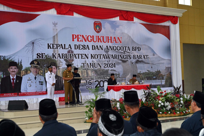 Pj Bupati Budi Santosa Kukuhkan Kepala Desa dan Anggota BPD se-Kobar