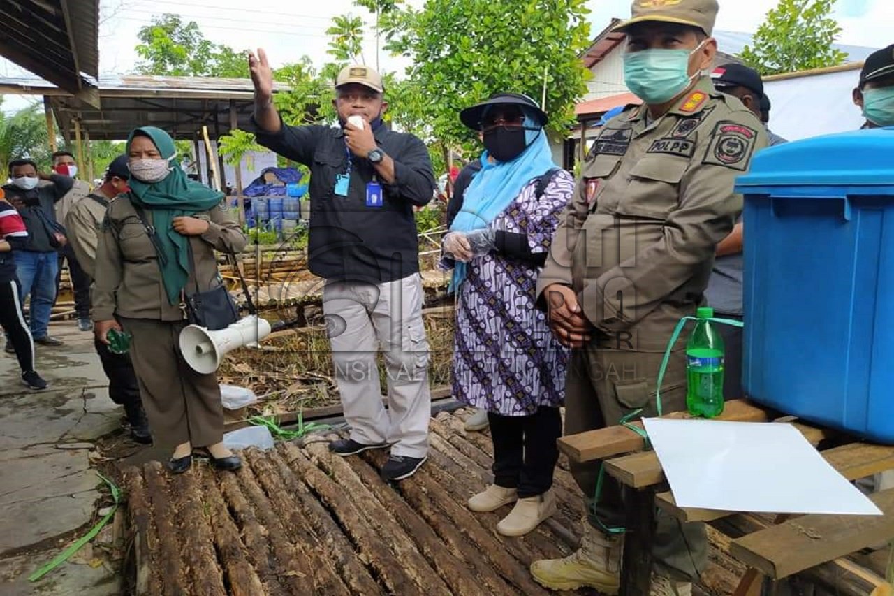 Tim GTPP Covid-19 Pulang Pisau Kembali Gelar Sosialisasi di Pasar Sebangau Kuala