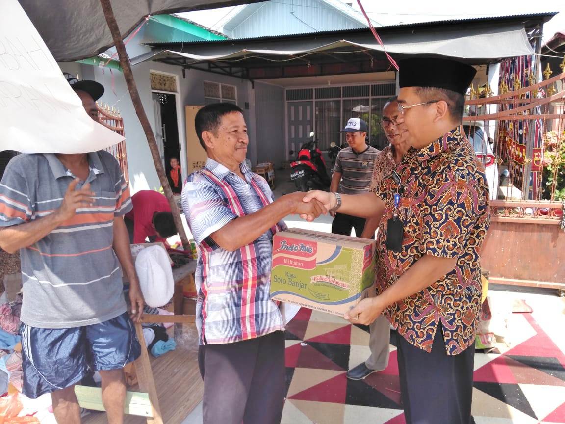 Peduli Kemanusian, Rutan Buntok Berbagi Kepada Warga Korban Kebakaran