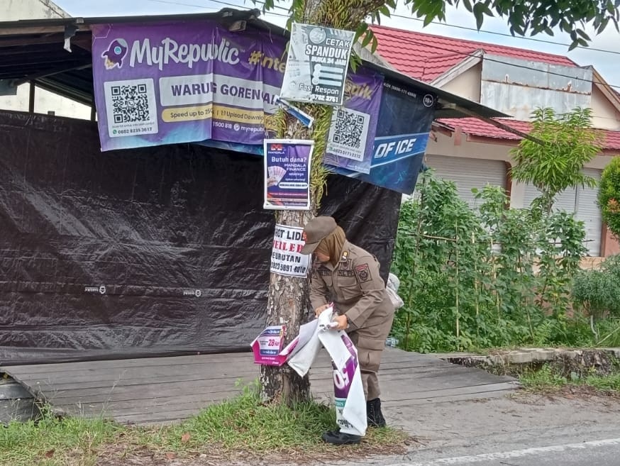 Tegakkan Perda dan Lindungi Aset Daerah, Satpol PP Kalteng Tertibkan Reklame Ilegal dan Kawal Aset Pemerintah