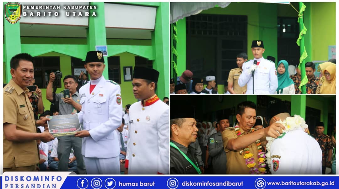 H. Nadalsyah Serahkan Penghargaan Kepada Siswa Berprestasi Pada HUT Ke-74 RI Di Madrasyah Aliyah Muara Teweh